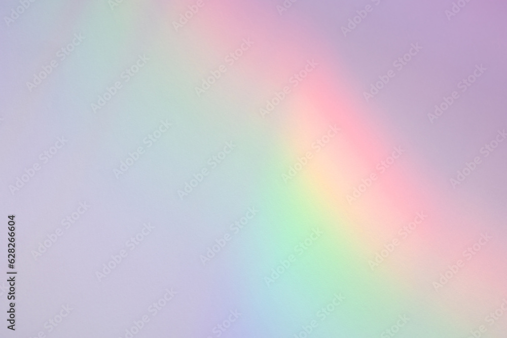 Neon rainbow gradient color light effect on white wall. Holographic light refraction overlay, subtle lighting, shading, unicorncore, lo-fi aesthetics. Abstract pastel colorful light leak bokeh texture