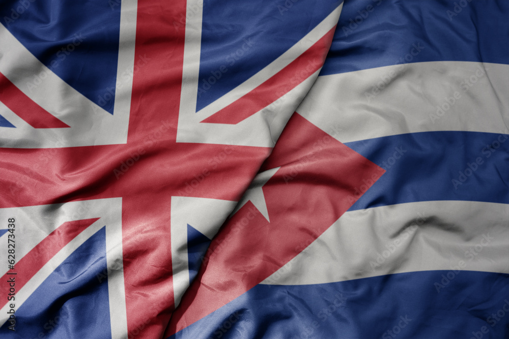 big waving national colorful flag of great britain and national flag of cuba . big waving national colorful flag of great britain and national flag of cuba .