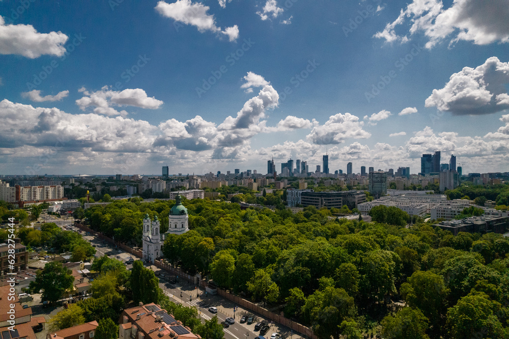 Fototapeta premium Drone, Warsaw city, sky, clouds, green, landscape, buildings, urban design, traffic, park, view, summer, blue