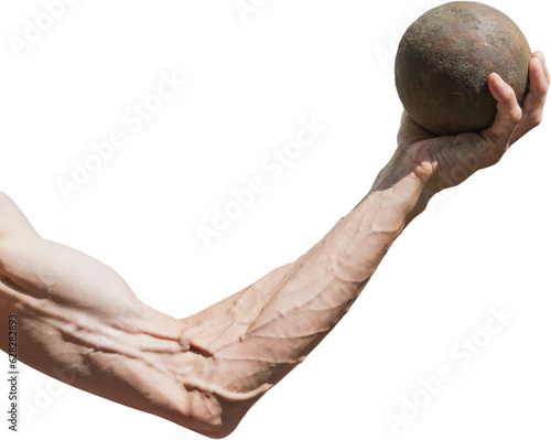 A human hand with large veins holds a metal ball photo