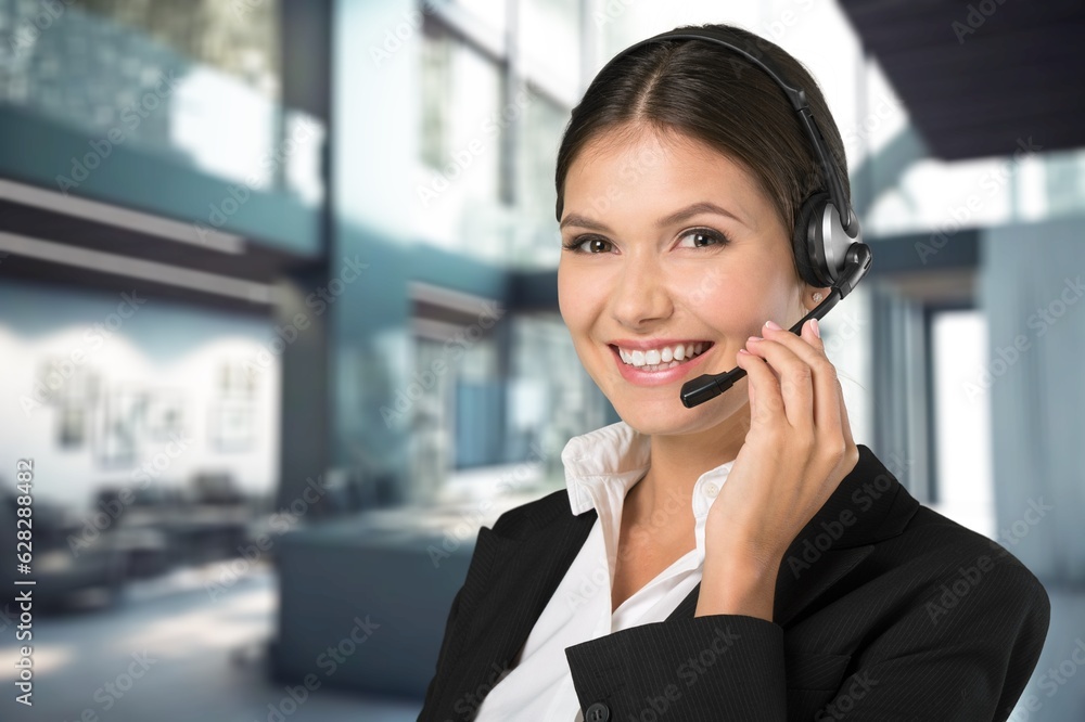 Smiling woman working with headset in modern office, AI generated image Smiling woman working with headset in modern office, AI generated image