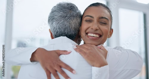 Nurse, doctor and happy woman hug in hospital for teamwork, celebration of success and support. Indian female medical student embrace healthcare professor for thank you, collaboration and gratitude photo