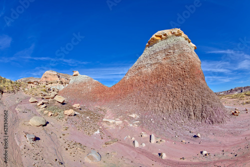 A pyramidal shaped bentonite formation along the Red Basin Trail in Petrified Forest National Park Arizona called the Red Sphinx. photo