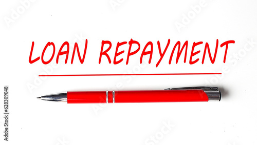 Text LOAN PAYMENT with ped pen on the white background photo