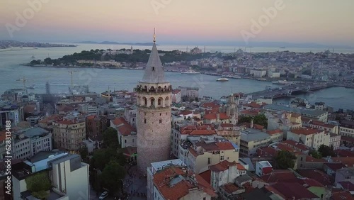 Wallpaper Mural Galata Tower and Istanbul City. Its one of the oldest towers in the world, build by Byzantium Emperor Anastasius in 507. Aerial view, drone turns around the tower over the city
 Torontodigital.ca