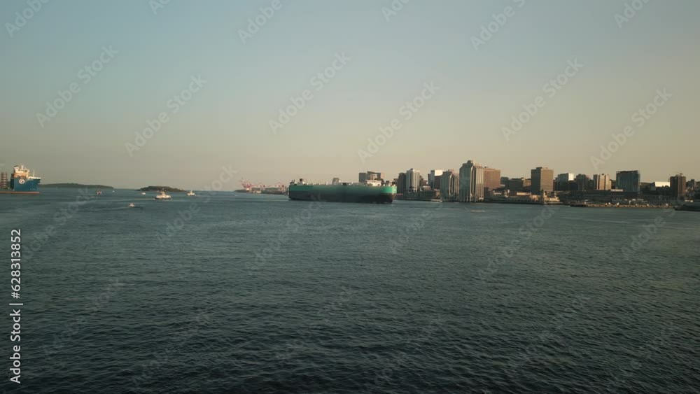 Aerial View of the Harbor of Halifax, and a Container Ship Entering the Harbor and Port of the City, a Cargo Ship will Deliver Products to the Country of Canada. Halifax, Canada, 10. June. 2023. Aerial View of the Harbor of Halifax, and a Container Ship Entering the Harbor and Port of the City, a Cargo Ship will Deliver Products to the Country of Canada. Halifax, Canada, 10. June. 2023.