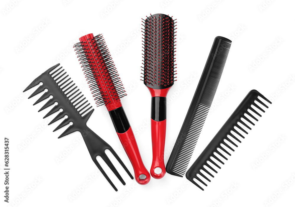 Set of hair brushes and combs isolated on white, top view Set of hair brushes and combs isolated on white, top view