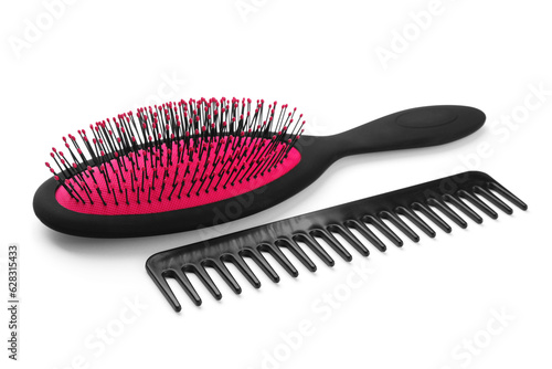Plastic hair brush and comb isolated on white