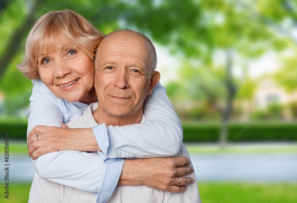 Happy active old couple walking outdoors. Happy active old couple walking outdoors.