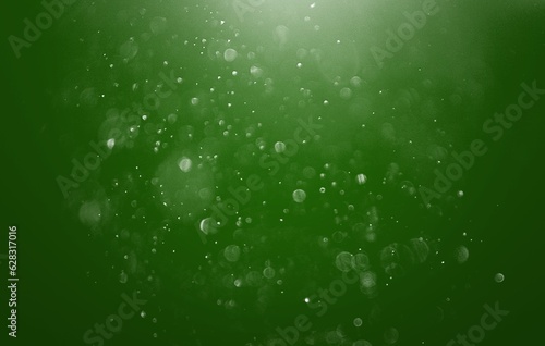 Bokeh glitter dust abstract green background