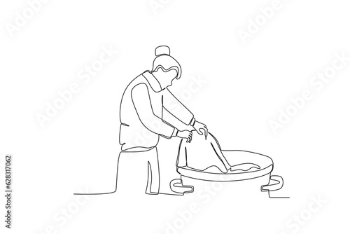 A homeless man takes a second-hand shirt. Homeless one-line drawing