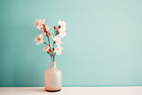 A vase with flowers on a clean colourful background