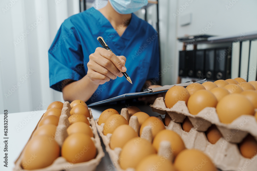 Lab test worker Quality control - Optimum Chicken Egg Quality ...