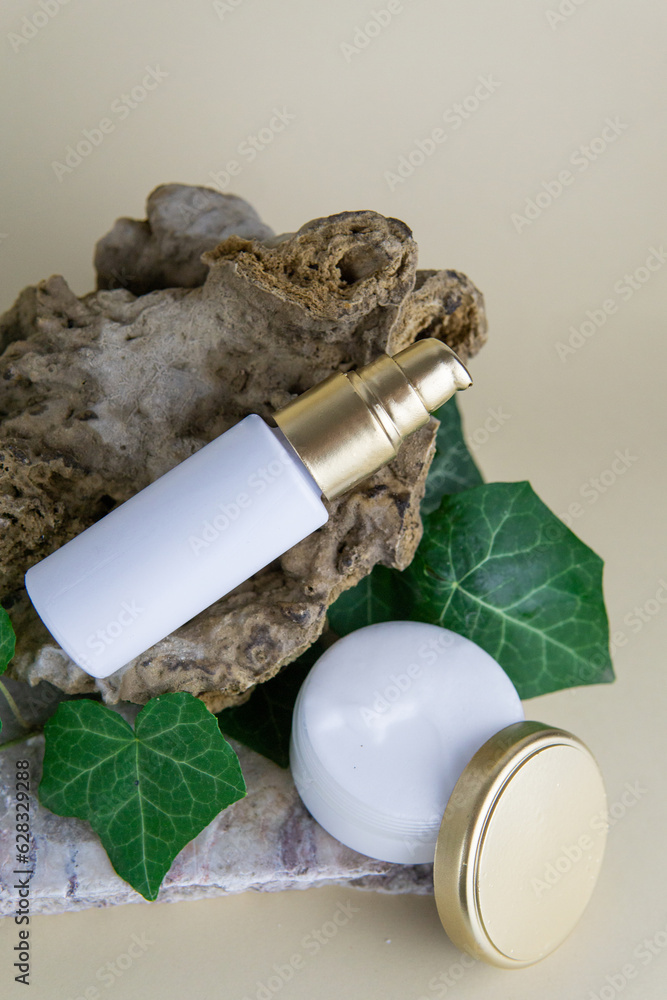 Skincare products in white and gold packaging 