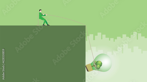A businessman pulls rope for a tree big lightbulb. ESG idea, Renewable, Alternative green energy, Environmental policy, Net zero emission, Carbon footprint reduction, Sustainable, Eco-friendly concept
