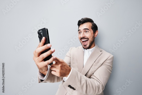 smartphone man phone holding suit portrait call smile hold business happy