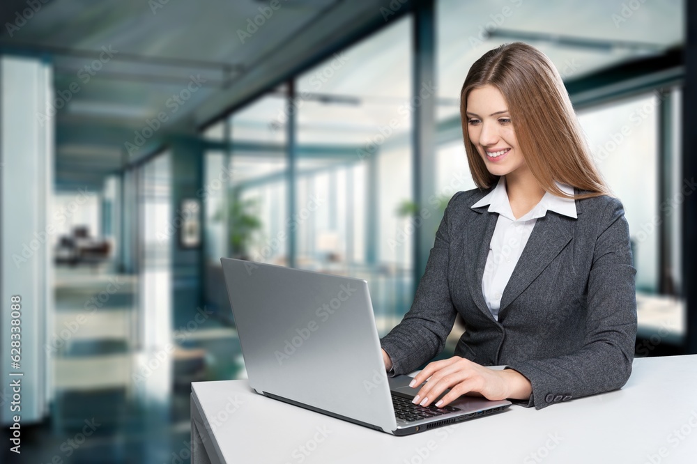 businesswoman working in modern office with laptop, AI generated image businesswoman working in modern office with laptop, AI generated image