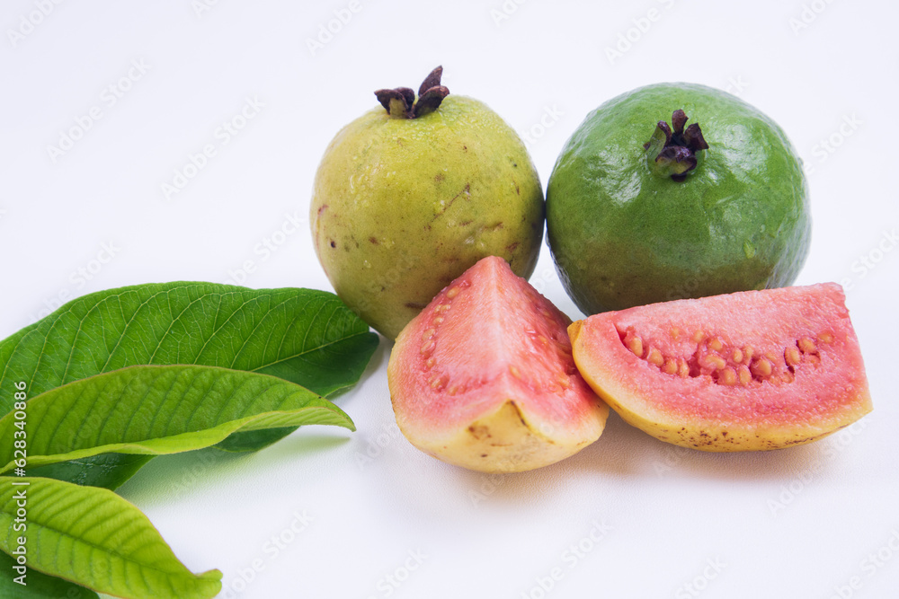 Close-Up of fresh red guava on white background and leaves. isolated red guava Close-Up of fresh red guava on white background and leaves. isolated red guava