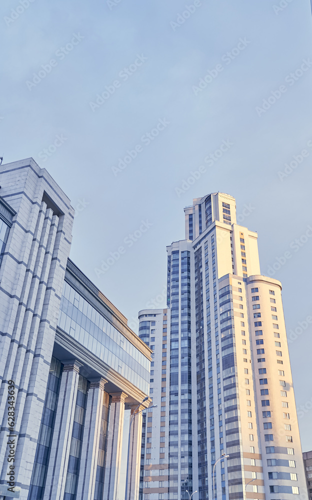 Skyscrapers, high-rise buildings from below against the sky, urban landscape, panorama of skyscrapers. Bottom view of modern skyscrapers in the business district. High quality photo Skyscrapers, high-rise buildings from below against the sky, urban landscape, panorama of skyscrapers. Bottom view of modern skyscrapers in the business district. High quality photo