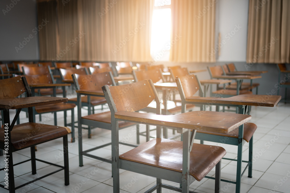 Empty classroom with vintage tone wooden chairs. Back to school concept