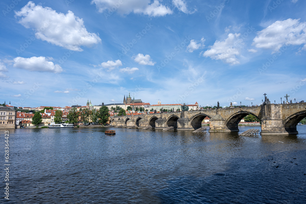 The famous Charles Bridge and the Castle  Hradcany in Prague on a sunny day