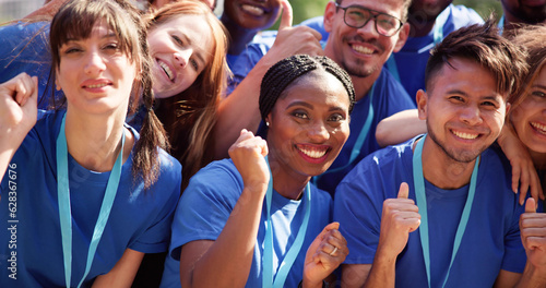 Cheerful Volunteer Team In Park