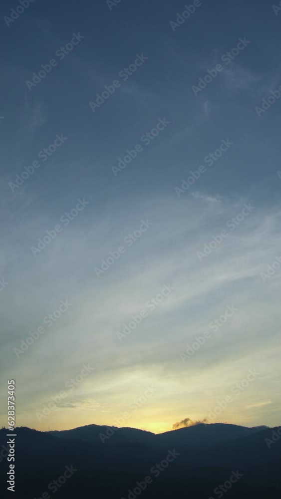Twilight and dawn sky with cumulus cloud vertical time lapse in an evening.
Twilight and dawn sky with cumulus cloud vertical time lapse in an evening.