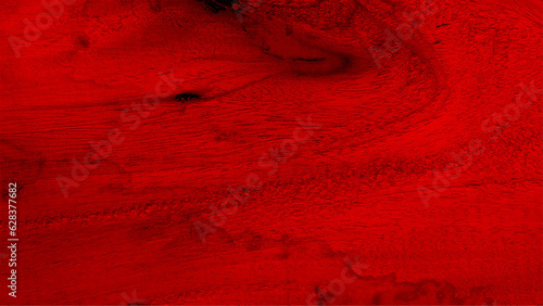 Red wood surface as background. Wood texture. Red