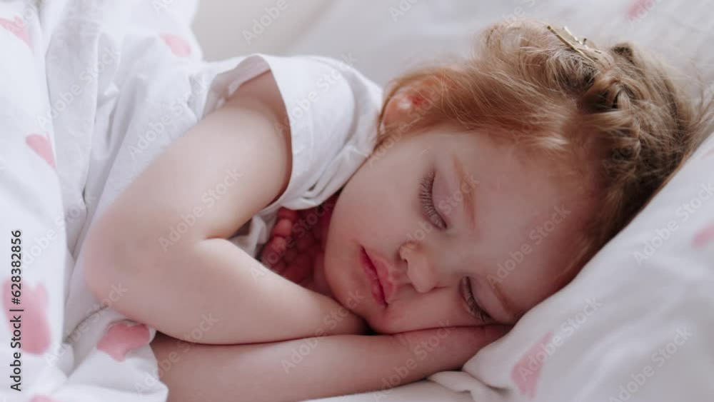 cute baby girl sleeping peacefully in bed cute baby girl sleeping peacefully in bed
