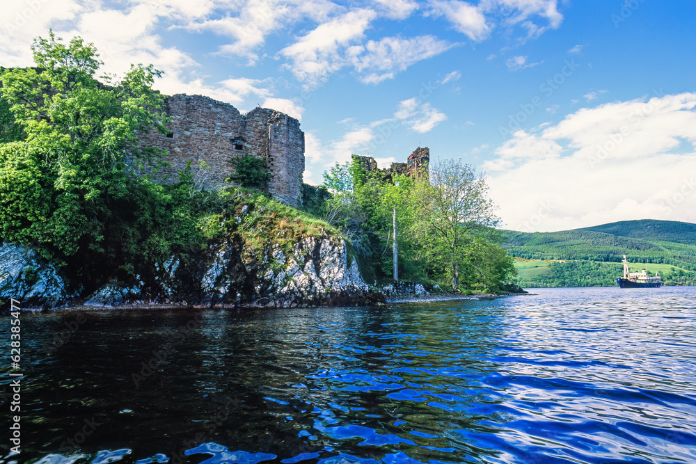 Urquhart castle ruins from the lakeside at Loch ness