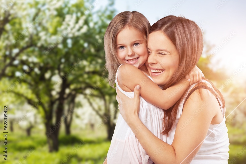 Young Mother with a small child, happy family outdoor. Young Mother with a small child, happy family outdoor.