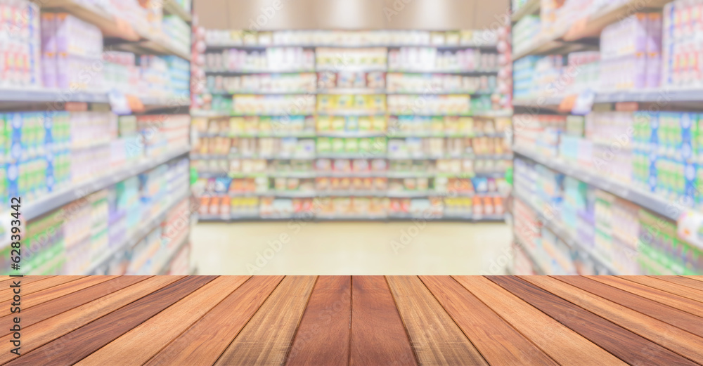Empty wood table top with supermarket blurred background for product display Empty wood table top with supermarket blurred background for product display