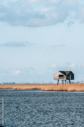 Beautiful photo of Kiekkaaste Bird Observatory in The Netherlands at Wadden Sea photo