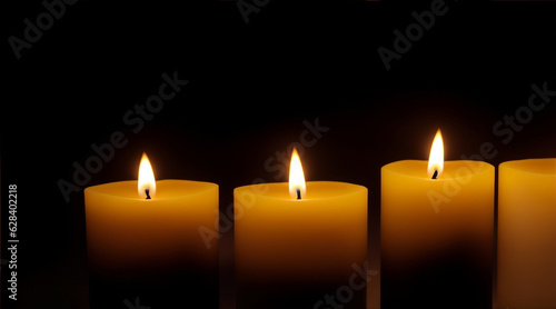 Lit candles on a black background. Generative AI.