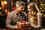 On Christmas Eve, a man and a woman give each other gifts