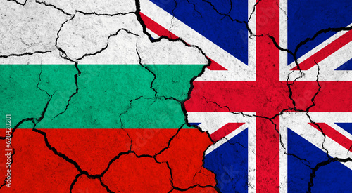 Flags of Bulgaria and United Kingdom on cracked surface - politics, relationship concept