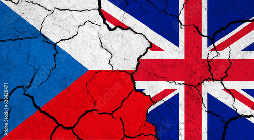 Flags of Czech republic and United Kingdom on cracked surface - politics, relationship concept