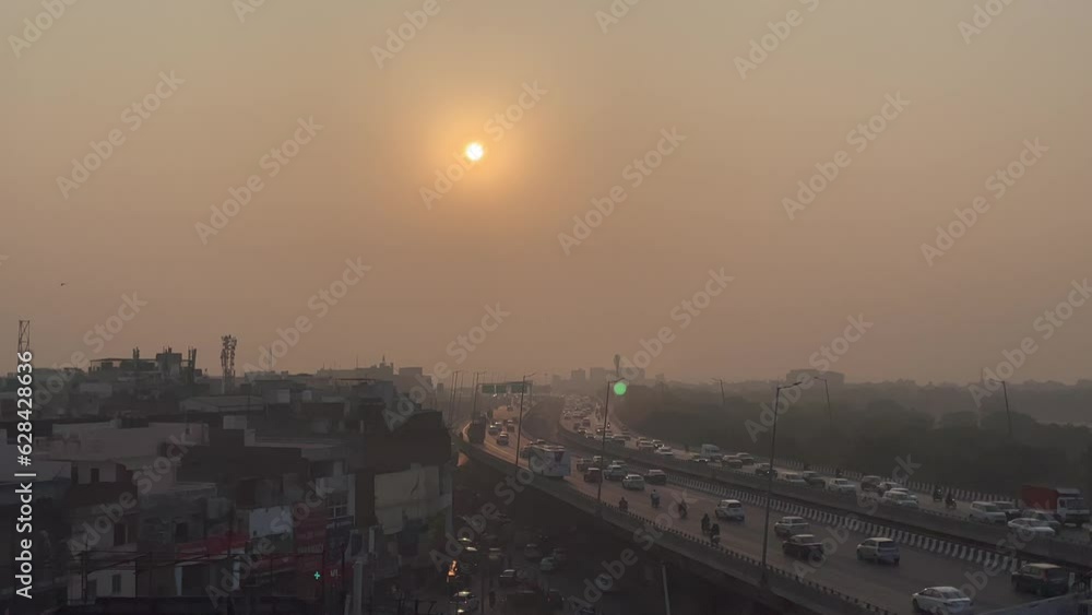 New Delhi India traffic on road running at evening sunset view. New Delhi India traffic on road running at evening sunset view.
