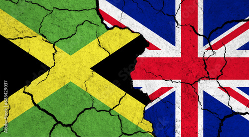Flags of Jamaica and United Kingdom on cracked surface - politics, relationship concept