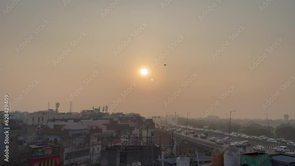 Delhi City India traffic on road running at evening sunset view. Delhi City India traffic on road running at evening sunset view.