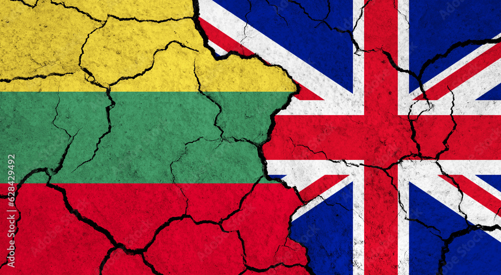 Fototapeta premium Flags of Lithuania and United Kingdom on cracked surface - politics, relationship concept