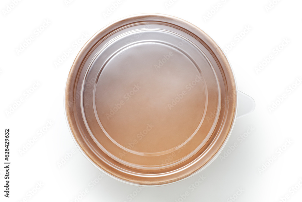 Disposable kraft paper bowl with plastic lid isolated on white background. Top view. Disposable kraft paper bowl with plastic lid isolated on white background. Top view.