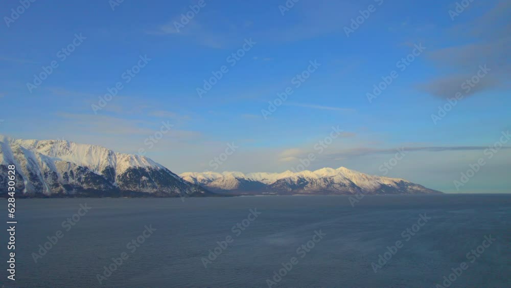 Stunning panoramic view of the mountains at sunrise along the Seward Highway. 4k drone. Stunning panoramic view of the mountains at sunrise along the Seward Highway. 4k drone.