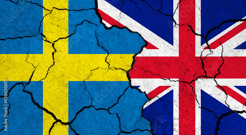 Flags of Sweden and United Kingdom on cracked surface - politics, relationship concept