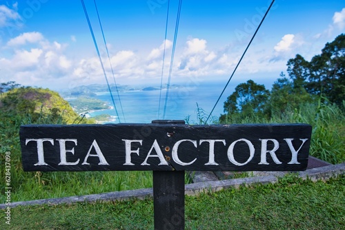 the factory sign and breath taking view point at the tea factory area on Mahe island, Seychelles