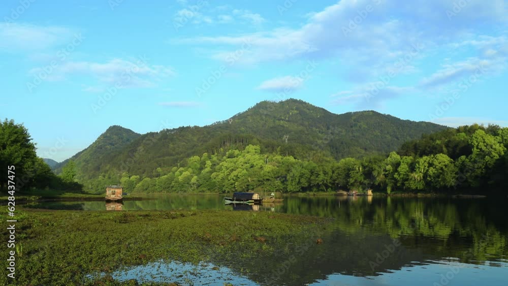 time lapse of Oujiang River sunrise with junk in the morning, Lishui, Zhejiang, China. time lapse of Oujiang River sunrise with junk in the morning, Lishui, Zhejiang, China.