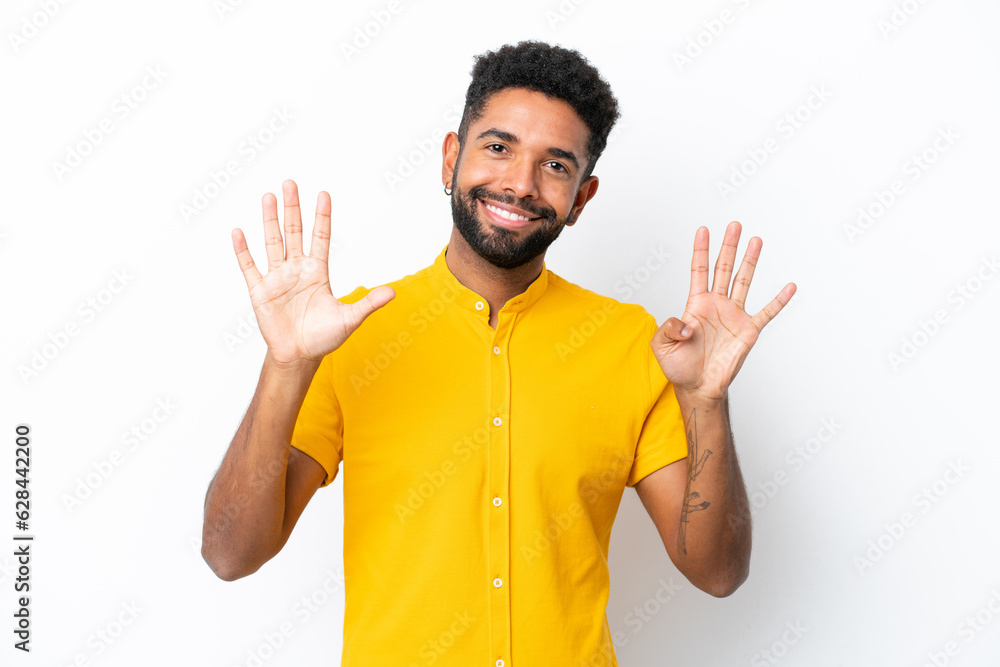 Young Brazilian man isolated on white background counting nine with fingers Young Brazilian man isolated on white background counting nine with fingers