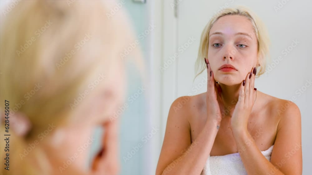 Tired woman who has just woken up gets ready for his morning shower. Tired woman who has just woken up gets ready for his morning shower.