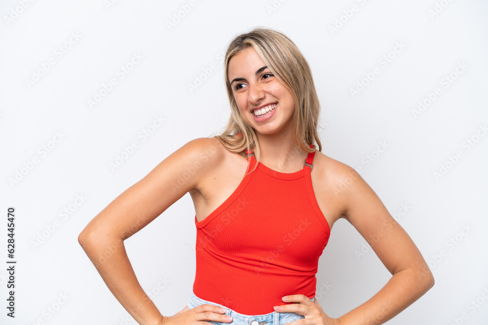 Young caucasian woman isolated on white background posing with arms at hip and smiling Young caucasian woman isolated on white background posing with arms at hip and smiling