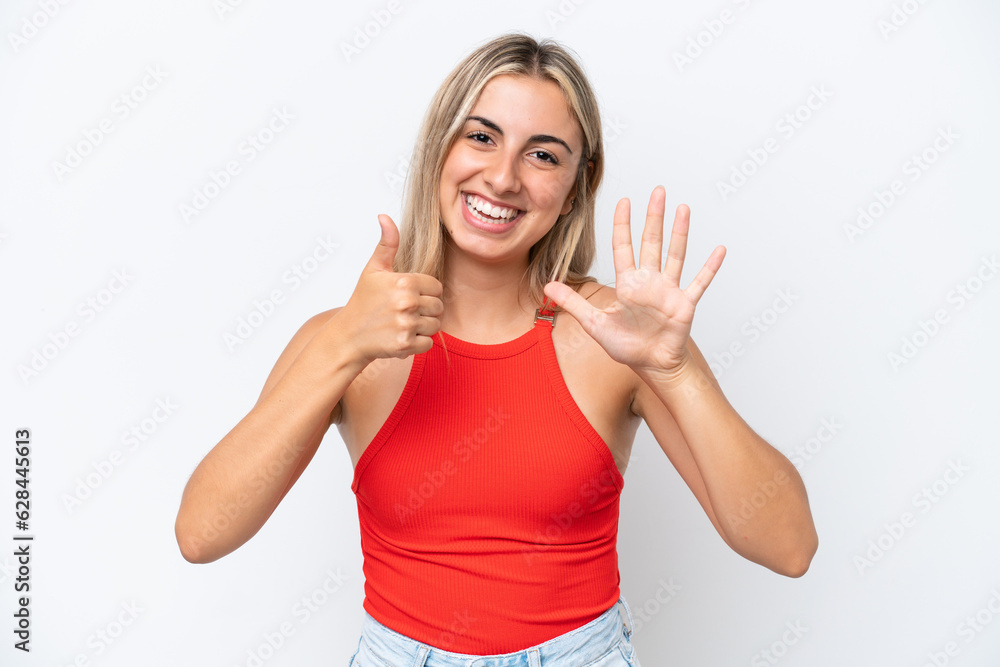 Young caucasian woman isolated on white background counting six with fingers Young caucasian woman isolated on white background counting six with fingers